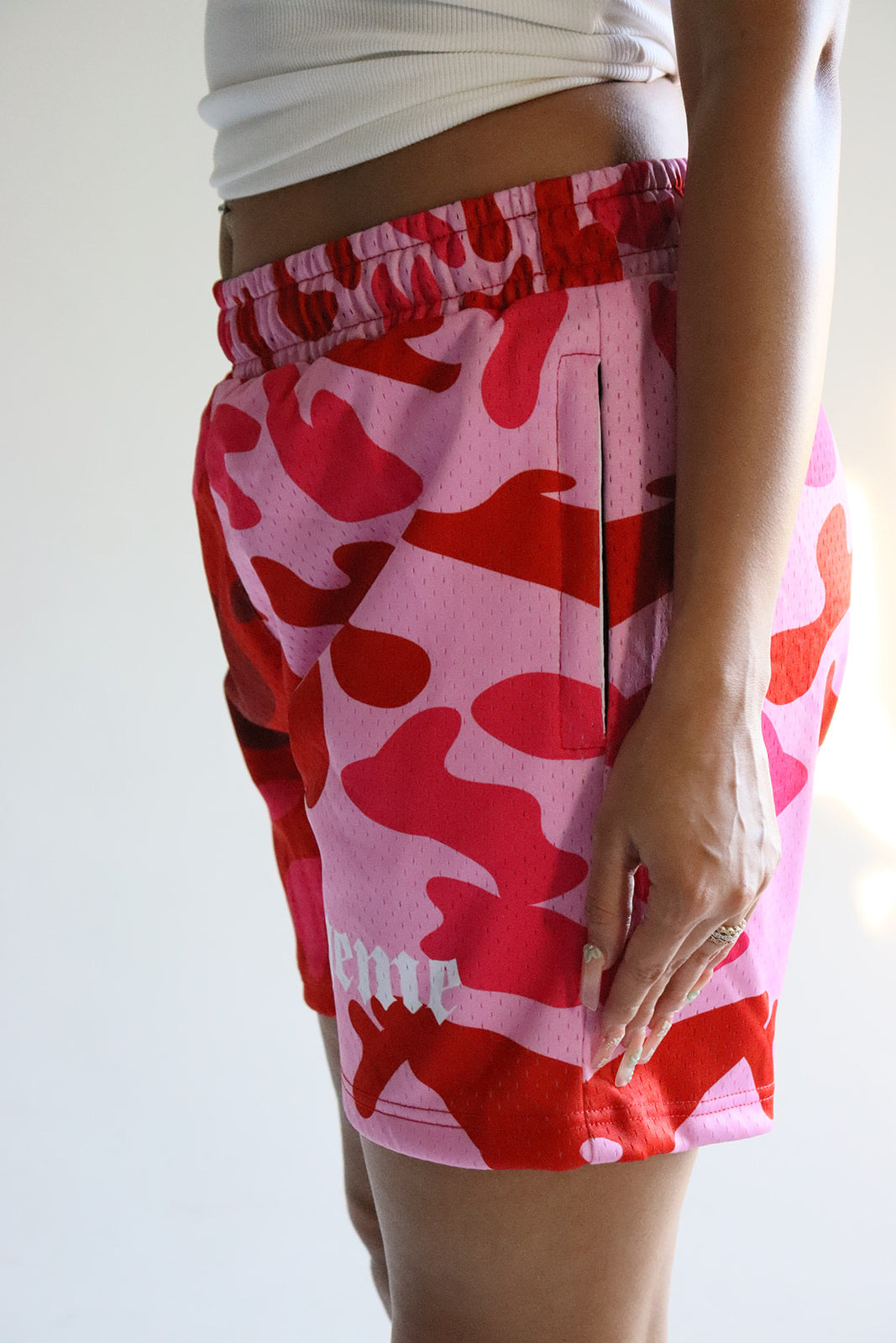 Men's graphic mesh shorts with a picture of red pink camo