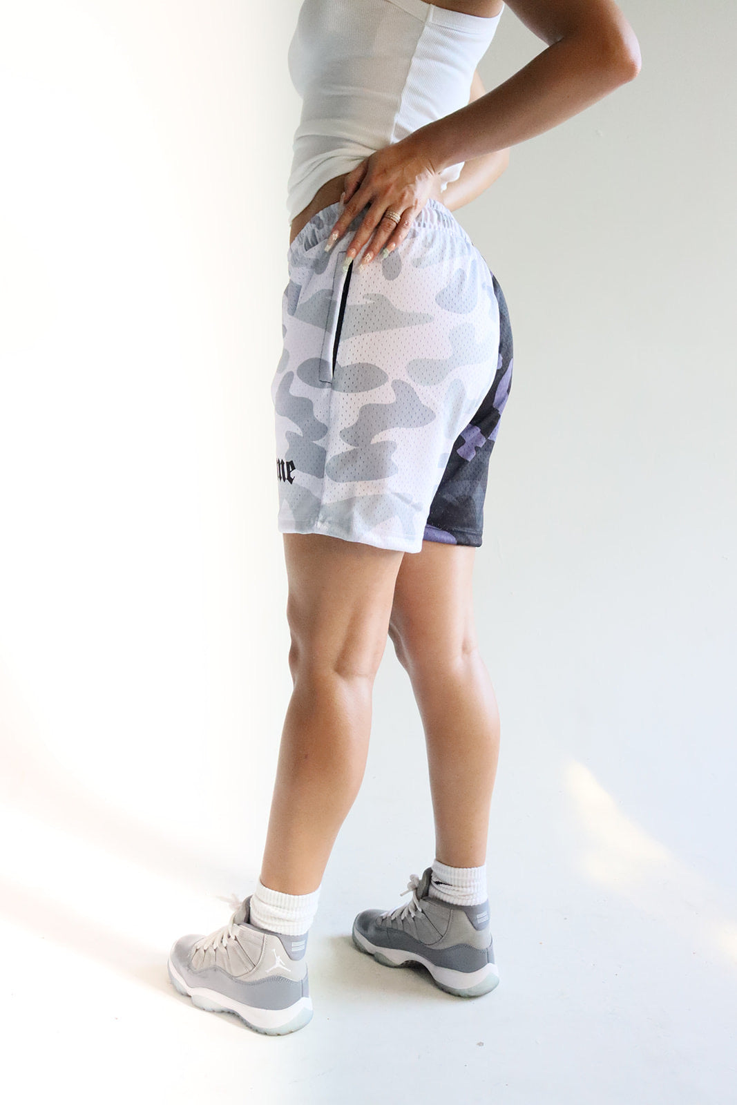 Men's graphic mesh shorts with a picture of white black gray camo