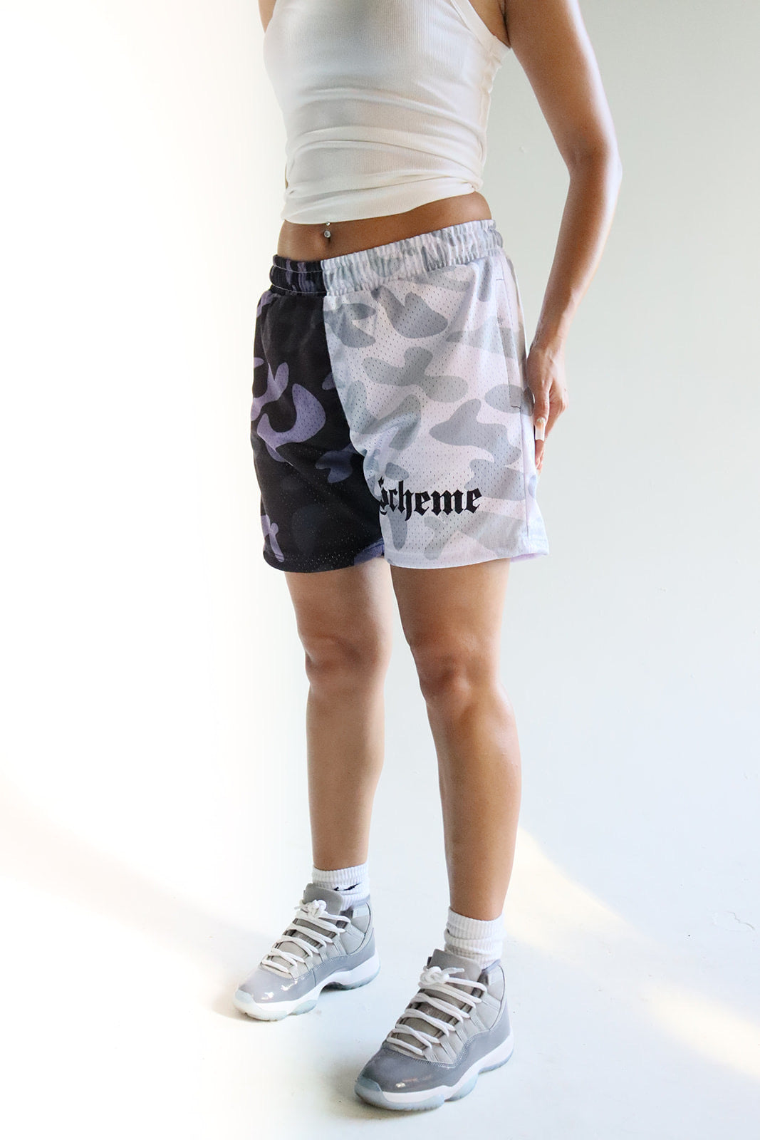 Men's graphic mesh shorts with a picture of white black gray camo