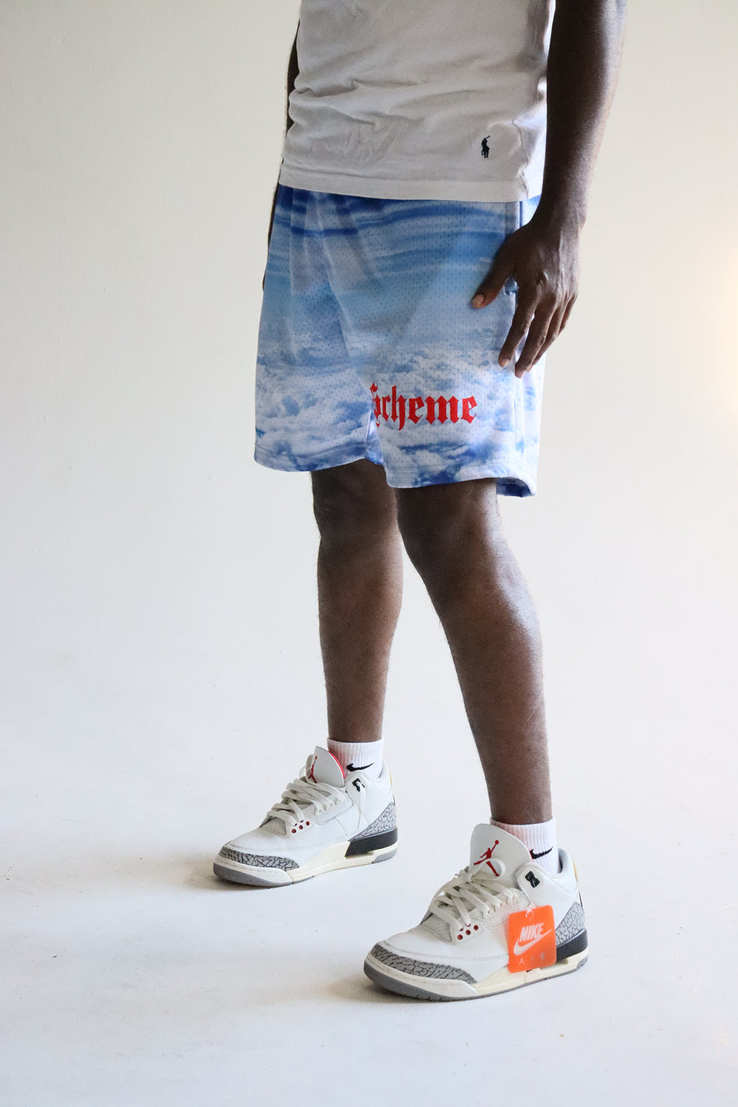 Men's graphic mesh shorts with a picture of sky clouds