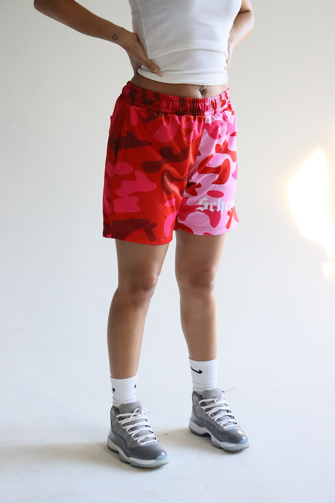 Men's graphic mesh shorts with a picture of red pink camo
