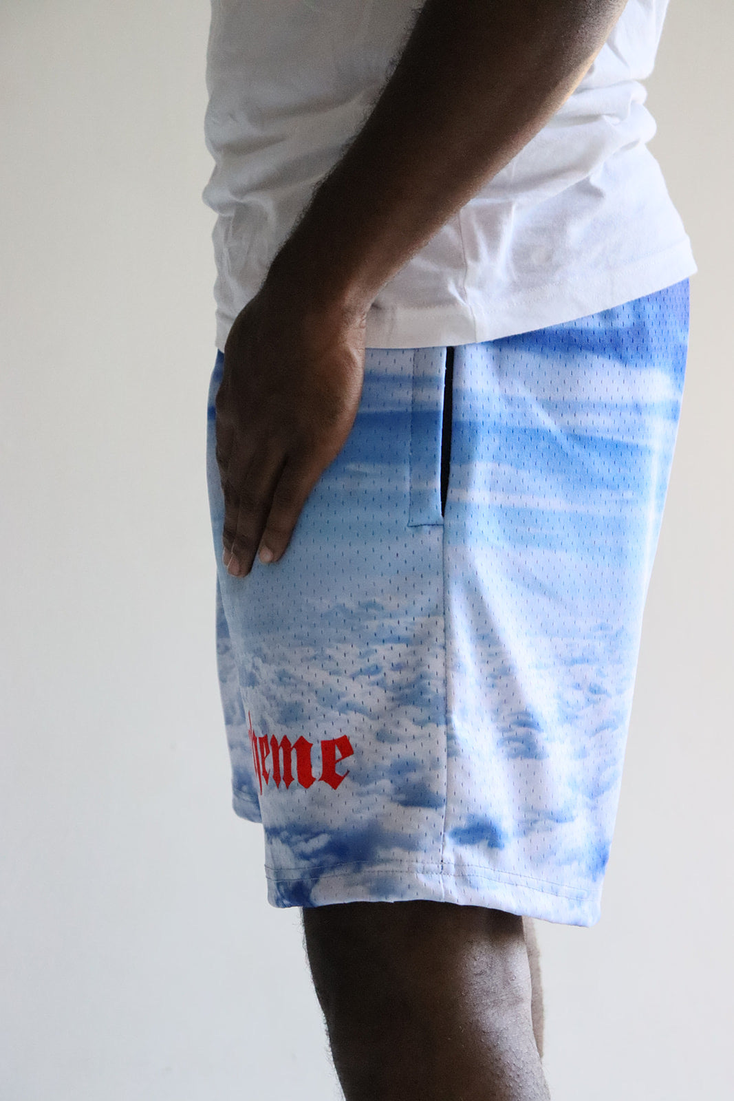 Men's graphic mesh shorts with a picture of sky clouds