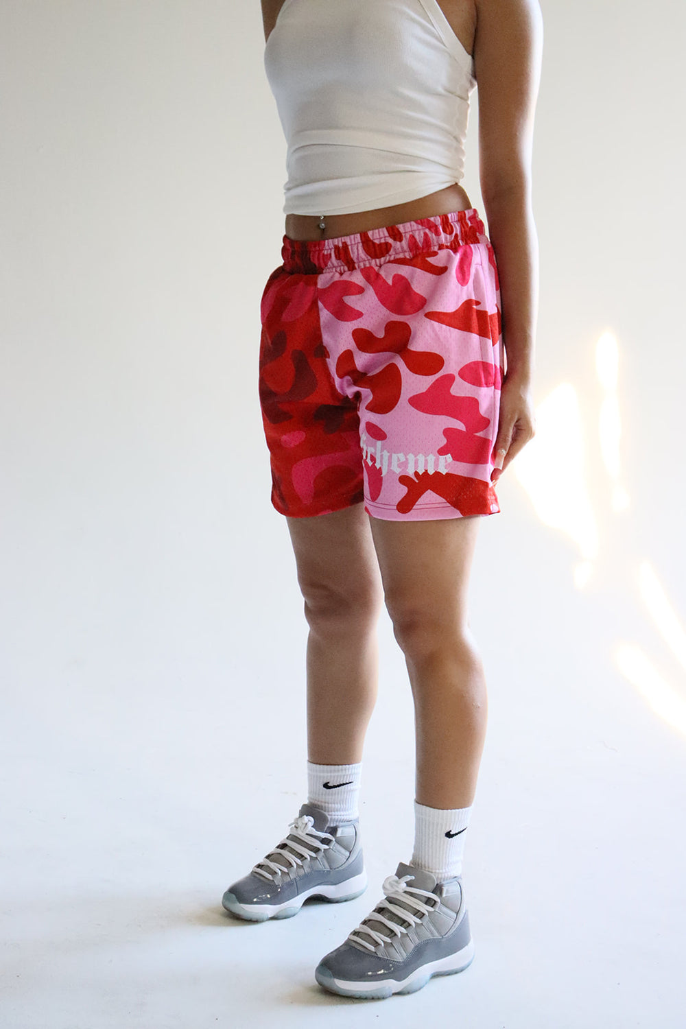 Men's graphic mesh shorts with a picture of red pink camo